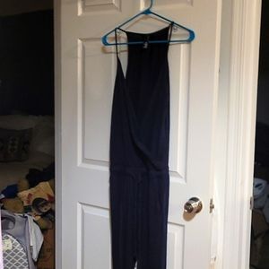 Navy blue jersey jumpsuit with pockets.  Bobi size small